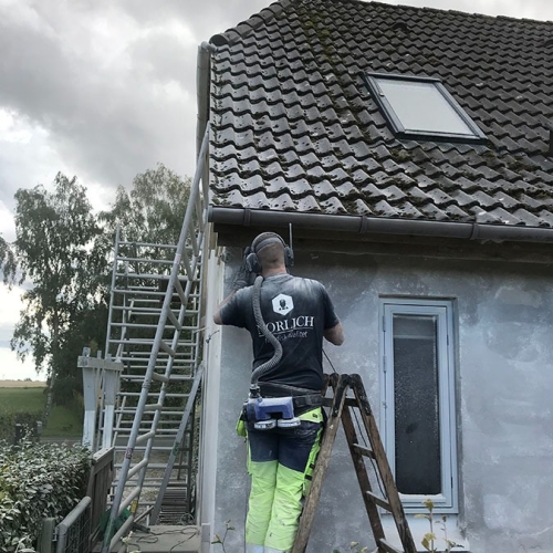 Sandblæsning af en villa i Greve Strand.